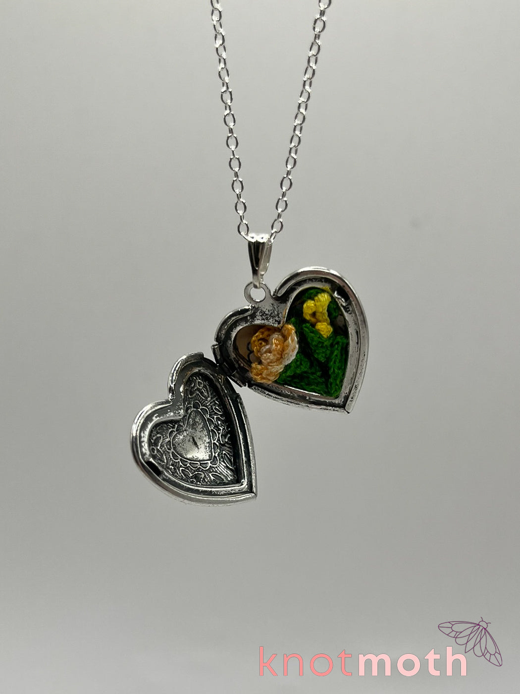 Iris (passion, joy) floriography micro-crochet locket