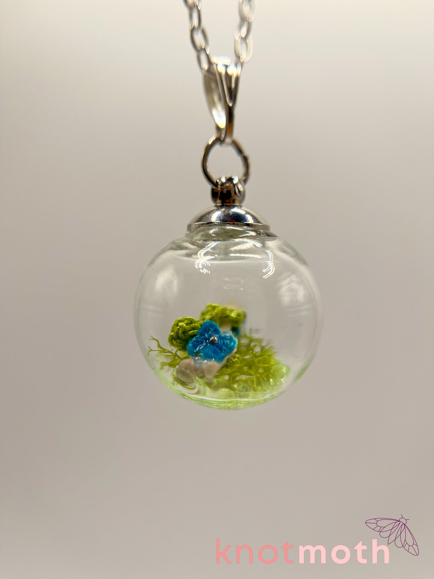 creeping speedwell & femur bone micro crochet mini globe necklace