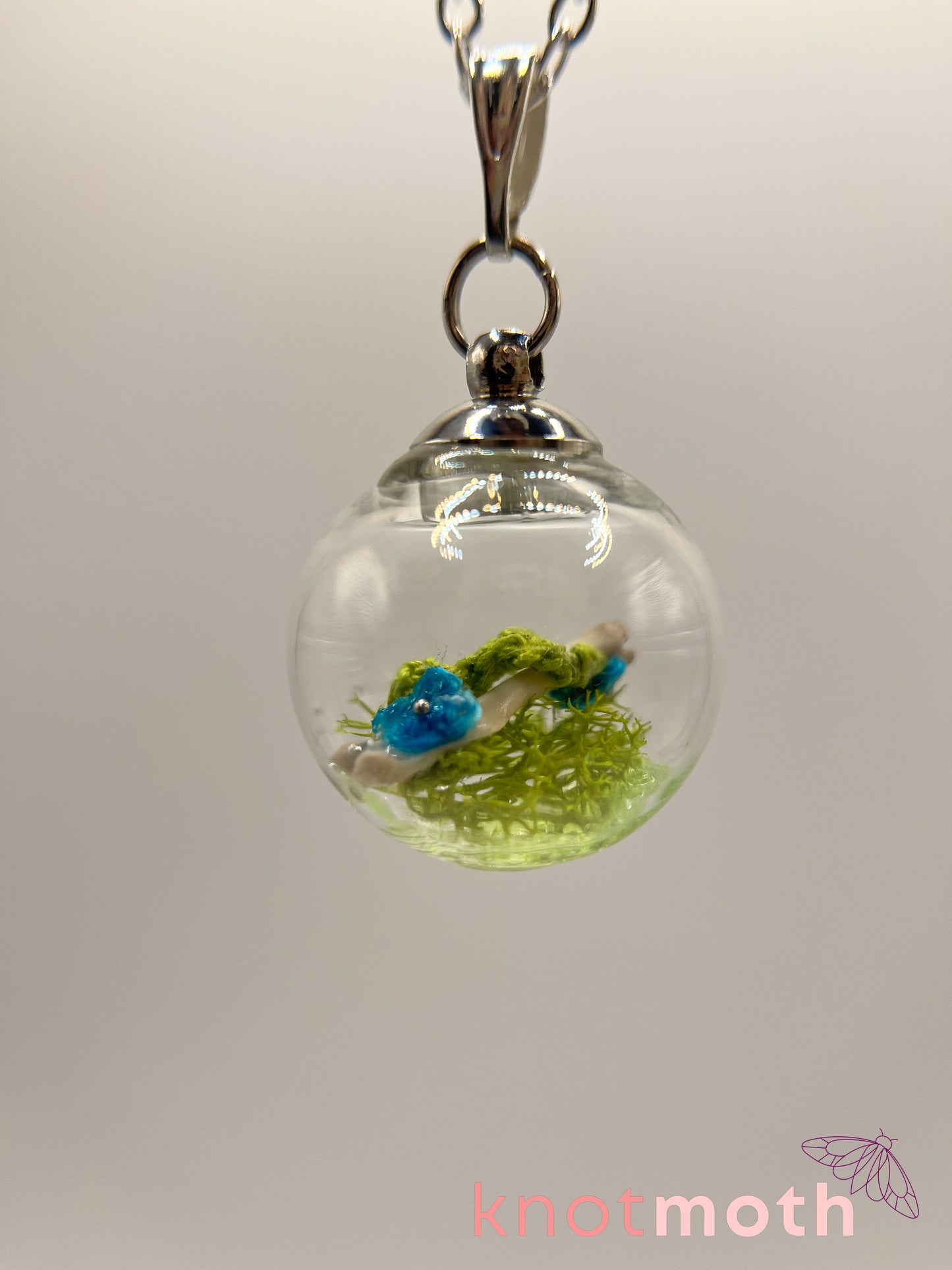 creeping speedwell & femur bone micro crochet mini globe necklace