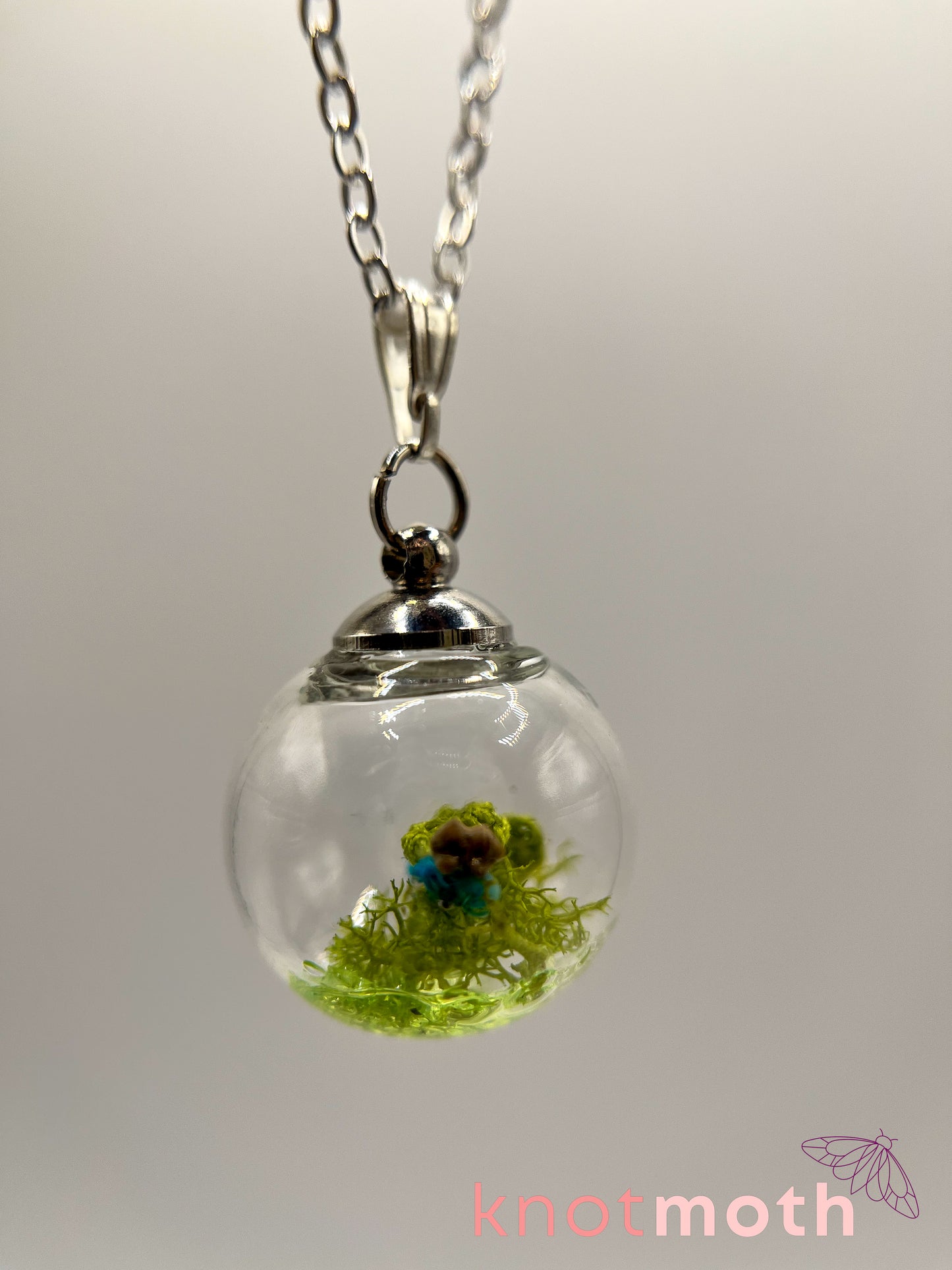 creeping speedwell & femur bone micro crochet mini globe necklace