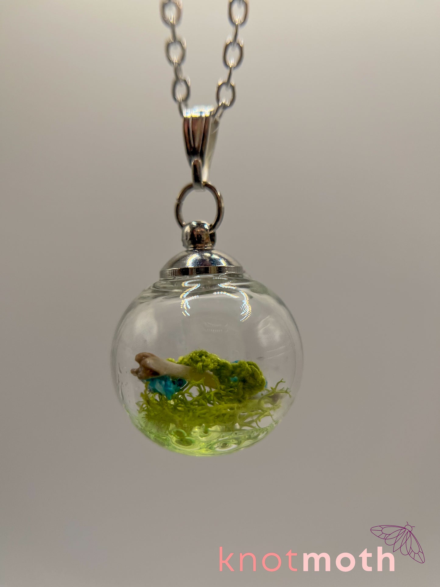 creeping speedwell & femur bone micro crochet mini globe necklace