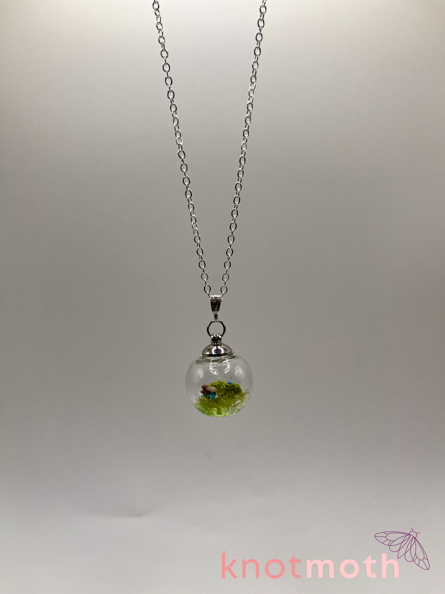 creeping speedwell & femur bone micro crochet mini globe necklace