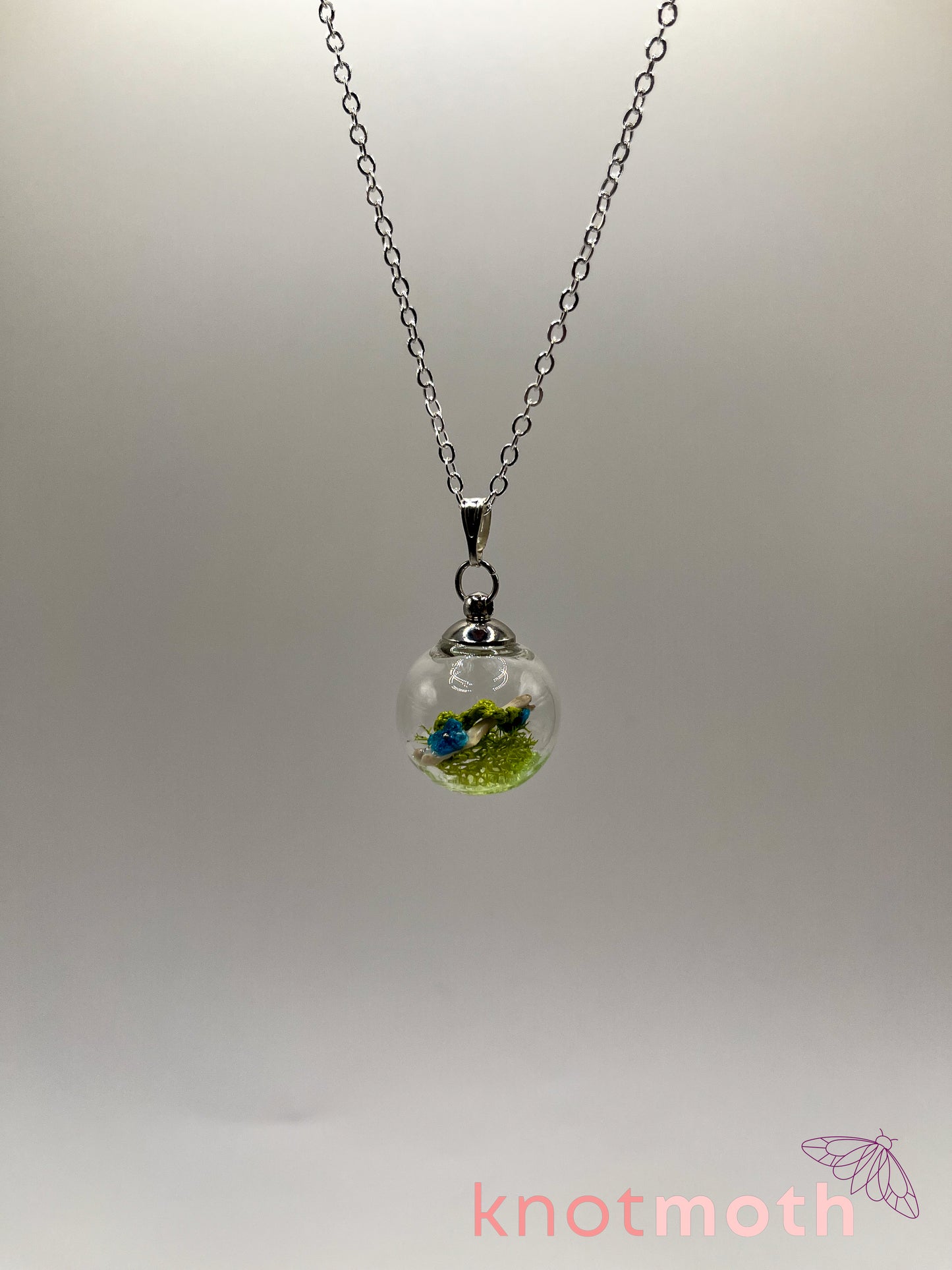 creeping speedwell & femur bone micro crochet mini globe necklace