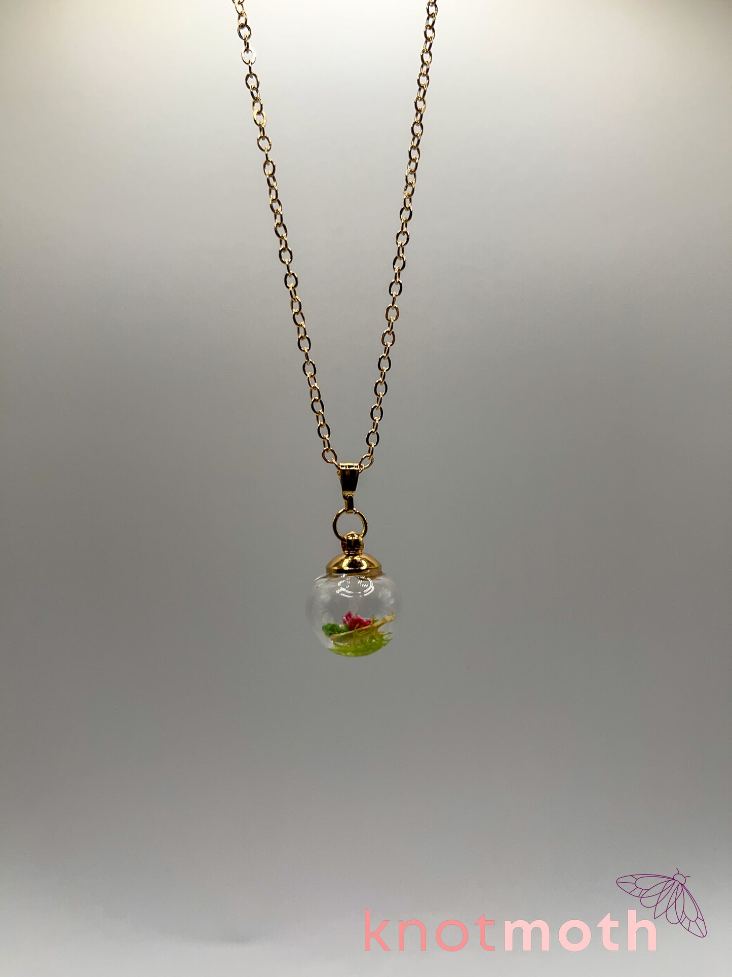 zinnia & scapula bone micro crochet mini globe necklace