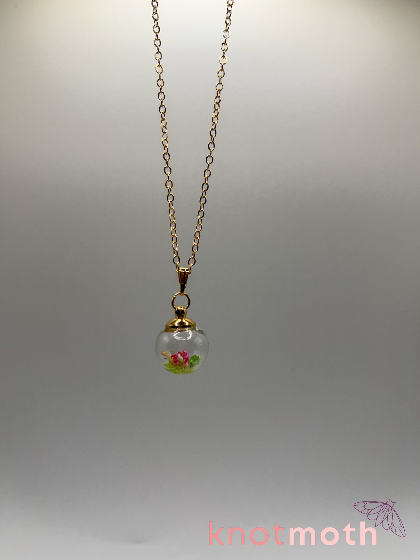 zinnia & scapula bone micro crochet mini globe necklace
