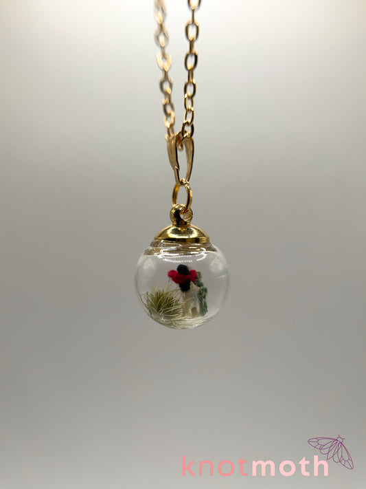 poppy flower & vertebra bone micro crochet mini globe necklace