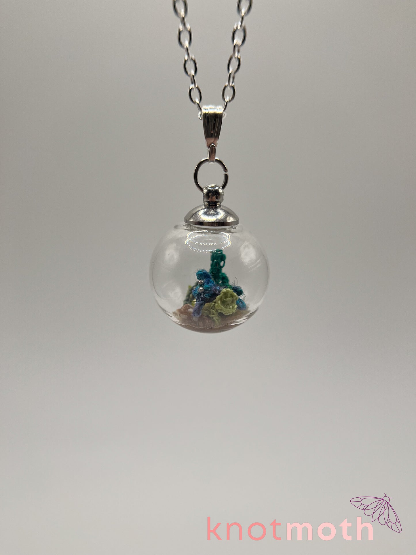 benny beta fish micro crochet globe necklace