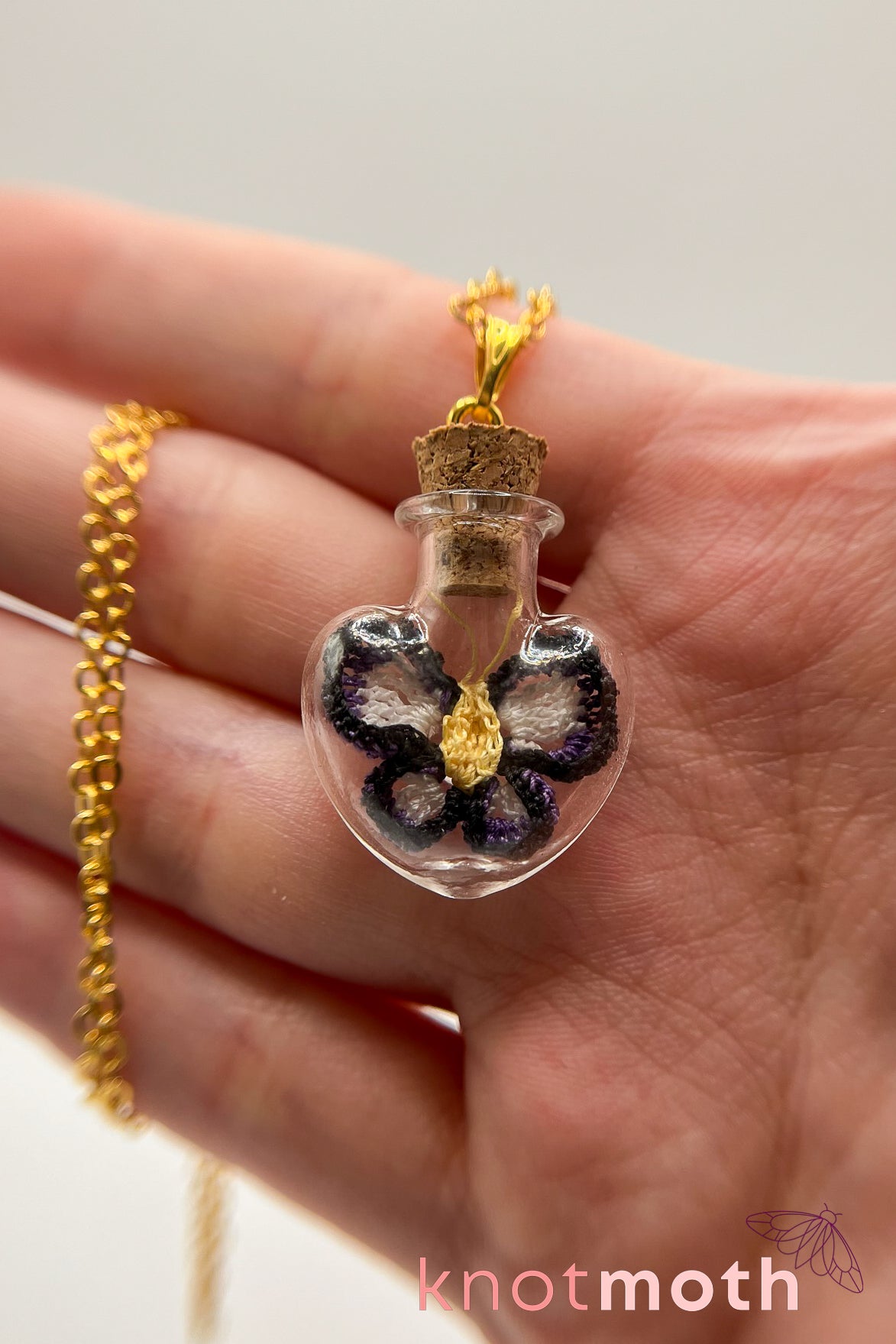 poe butterfly trinket jar necklace