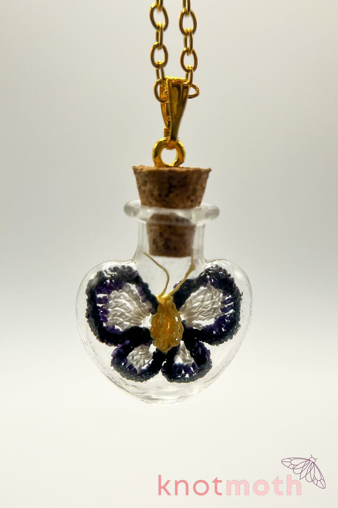 poe butterfly trinket jar necklace