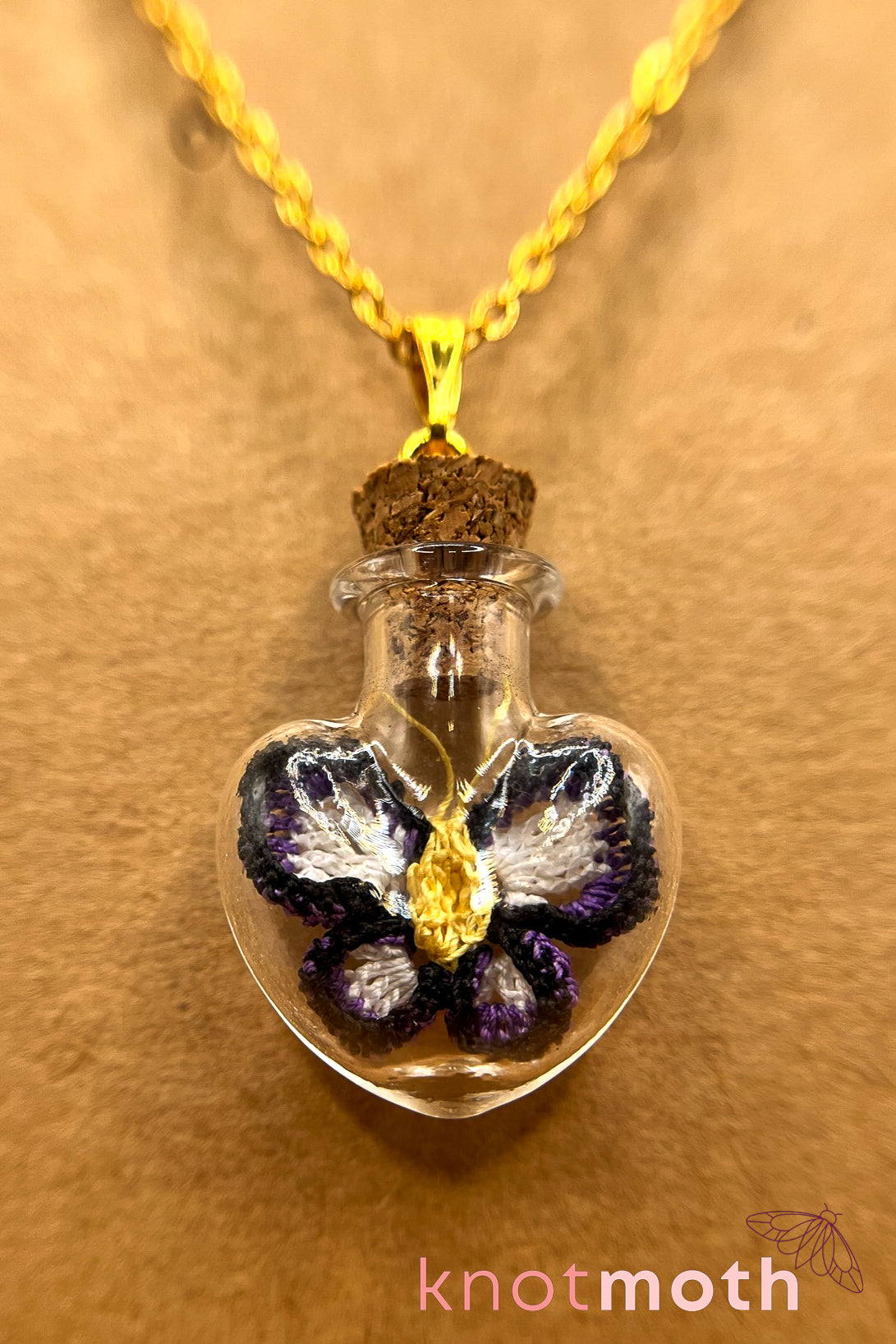 poe butterfly trinket jar necklace