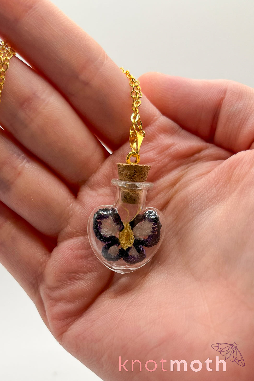 poe butterfly trinket jar necklace