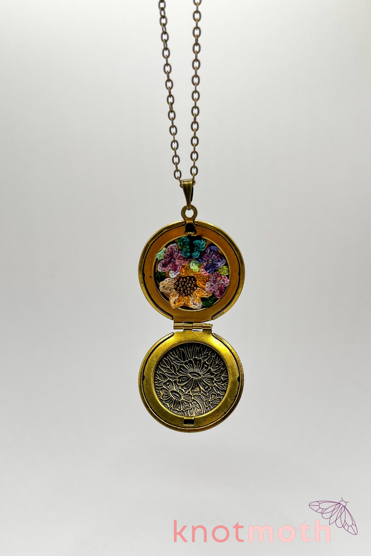 Sunflower, lilacs, and butterfly (joy & love) floriography micro-crochet locket