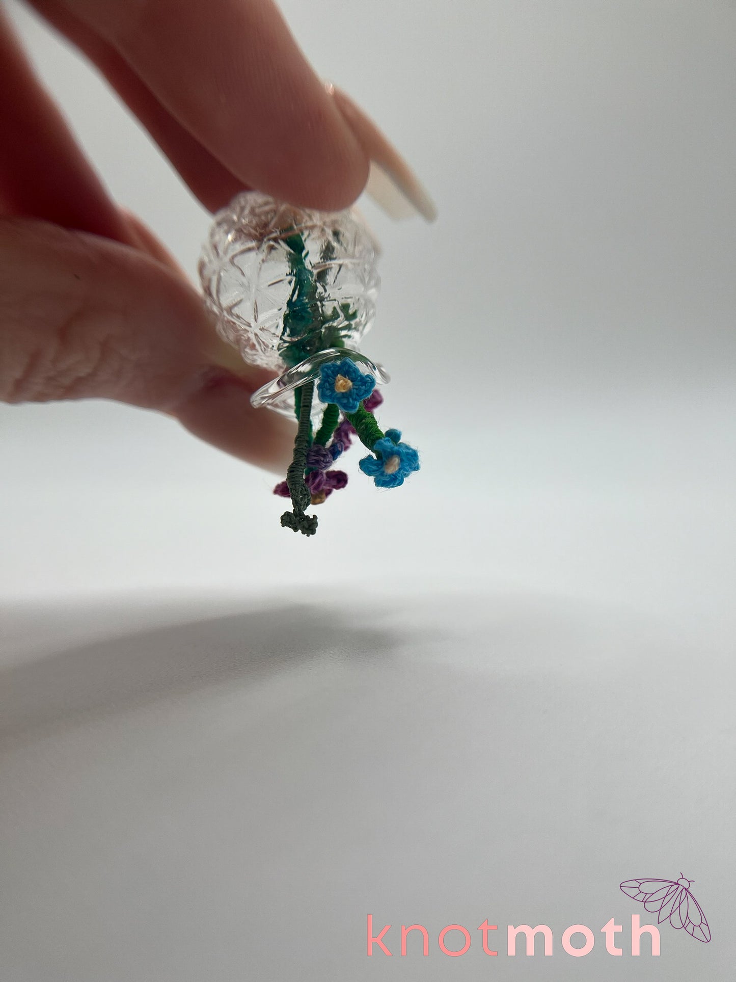 micro crochet flower arrangement in glass vase
