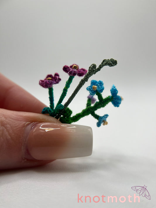 micro crochet flower arrangement in glass vase