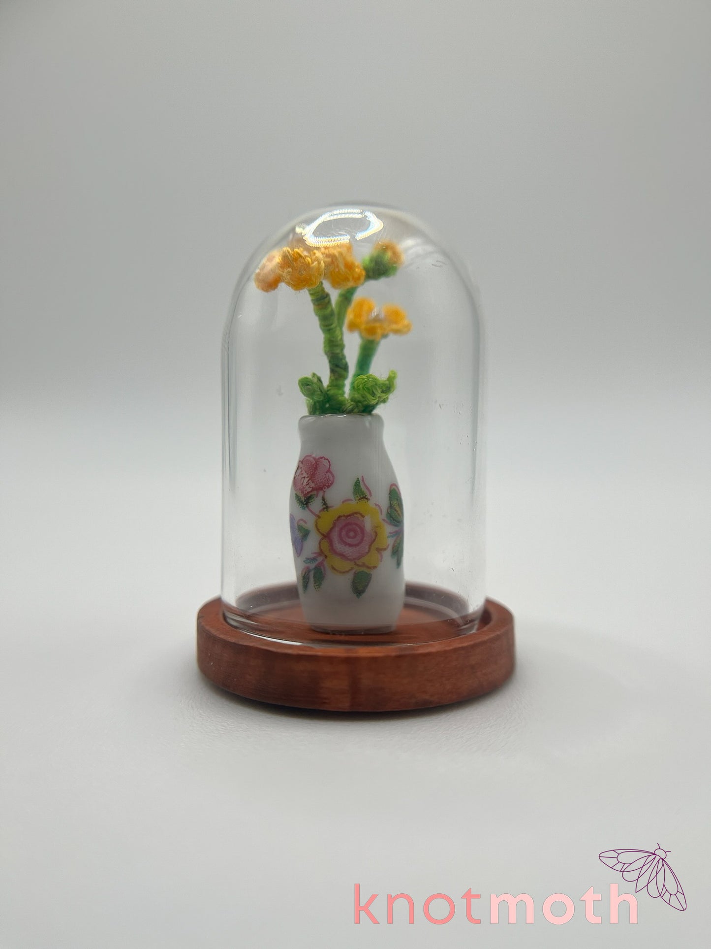 micro crochet flower arrangement in ceramic vase
