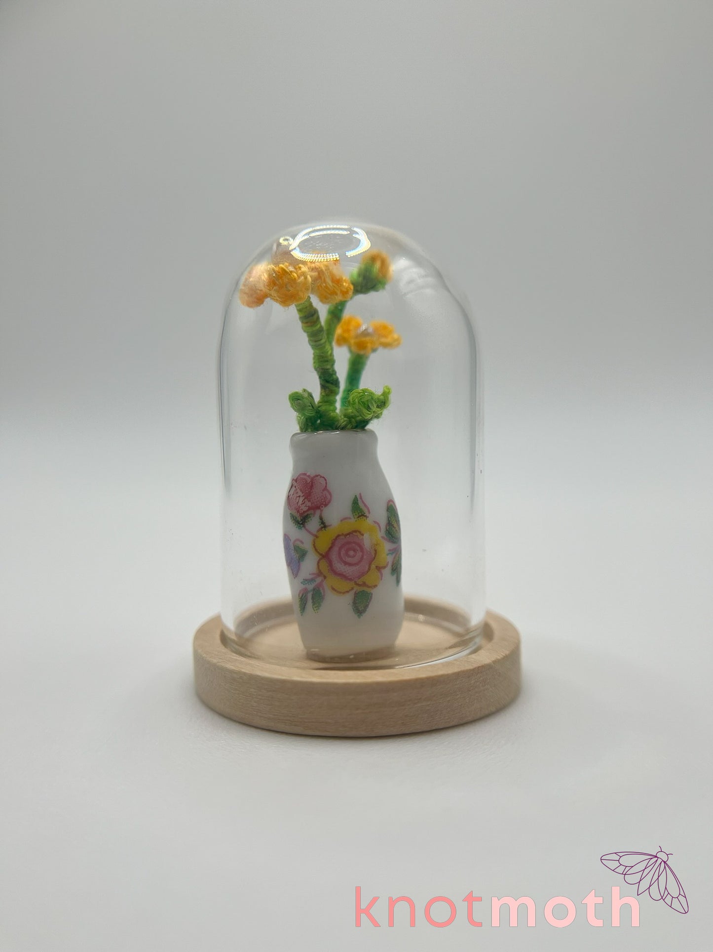 micro crochet flower arrangement in ceramic vase