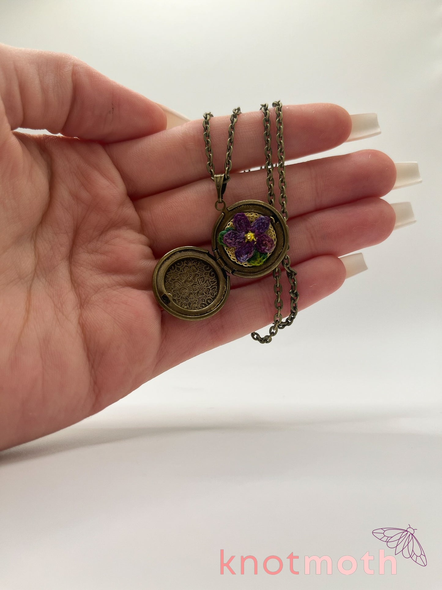 violet floriography micro-crochet locket