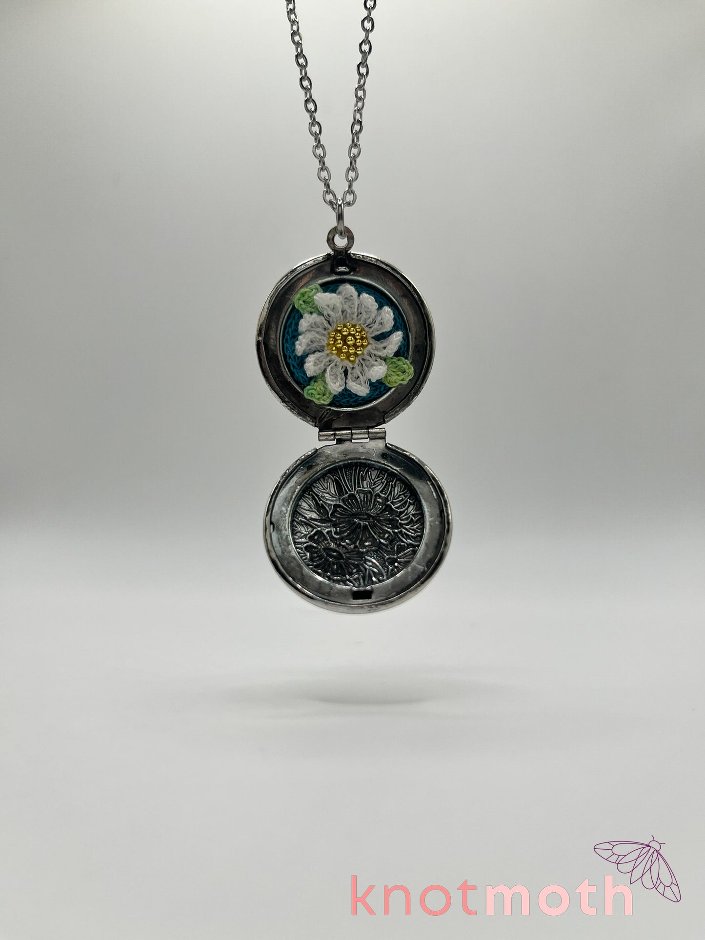 daisy floriography micro crochet locket