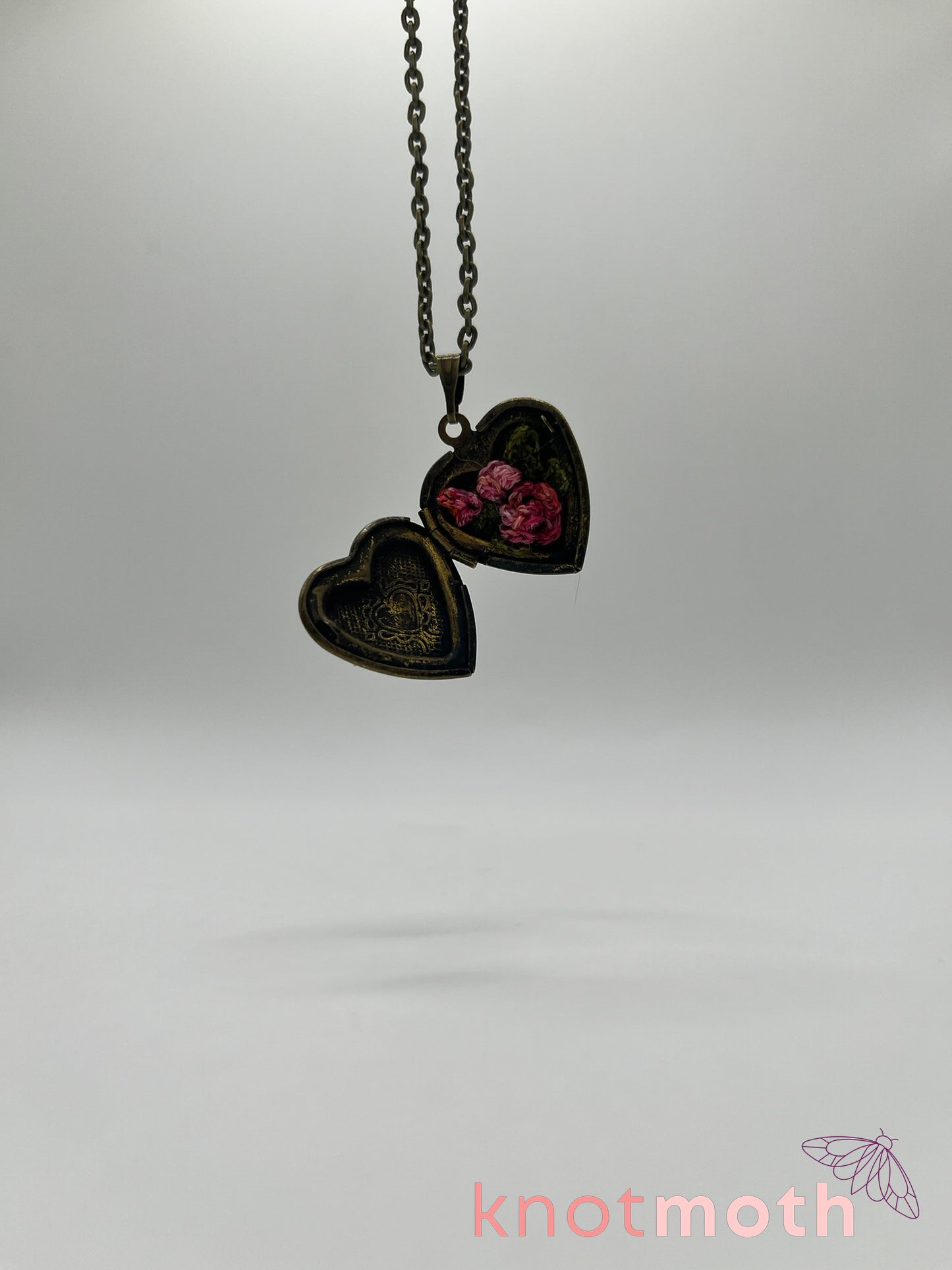 roses floriography micro-crochet locket