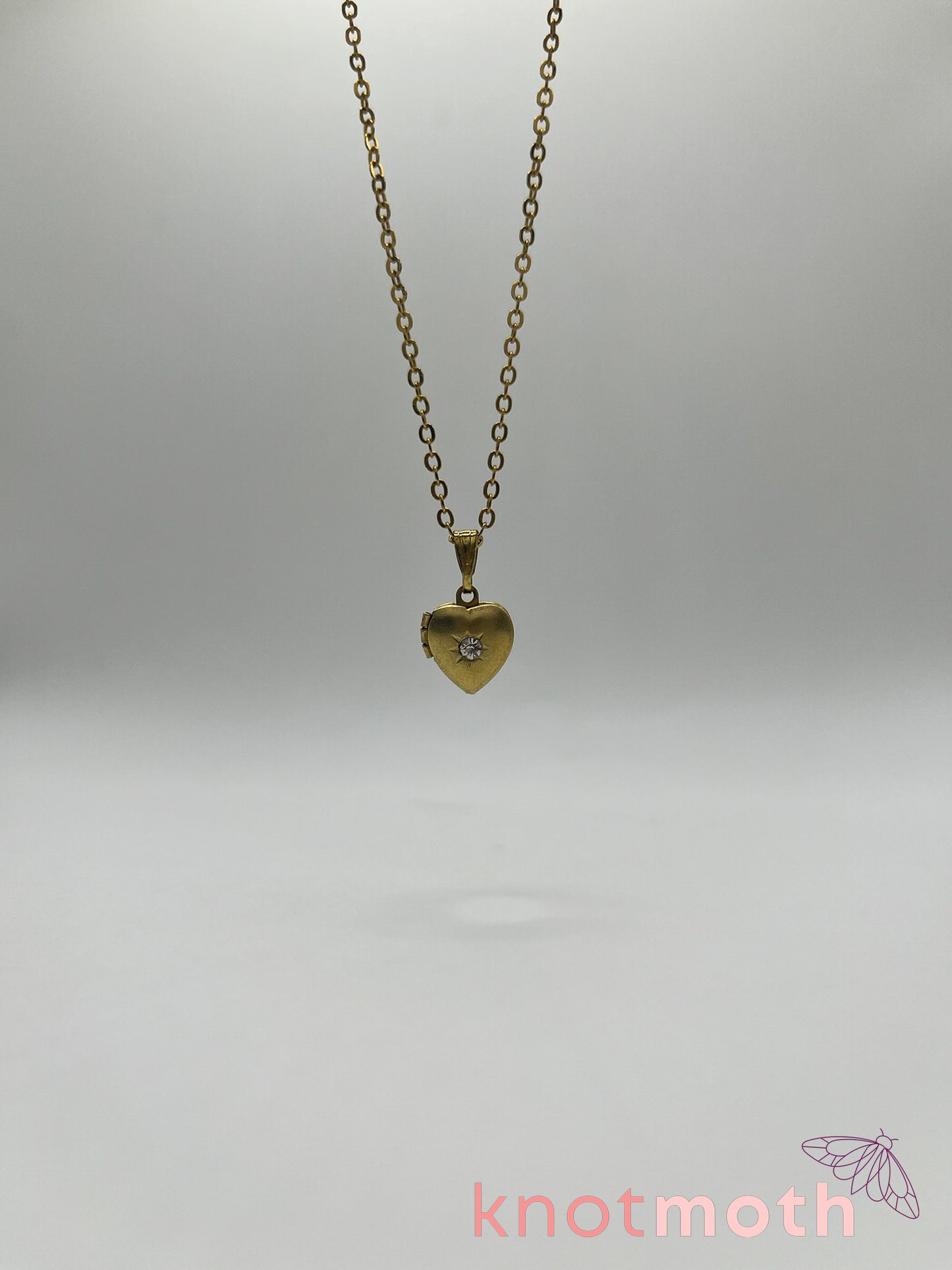 violets floriography micro-crochet heart locket