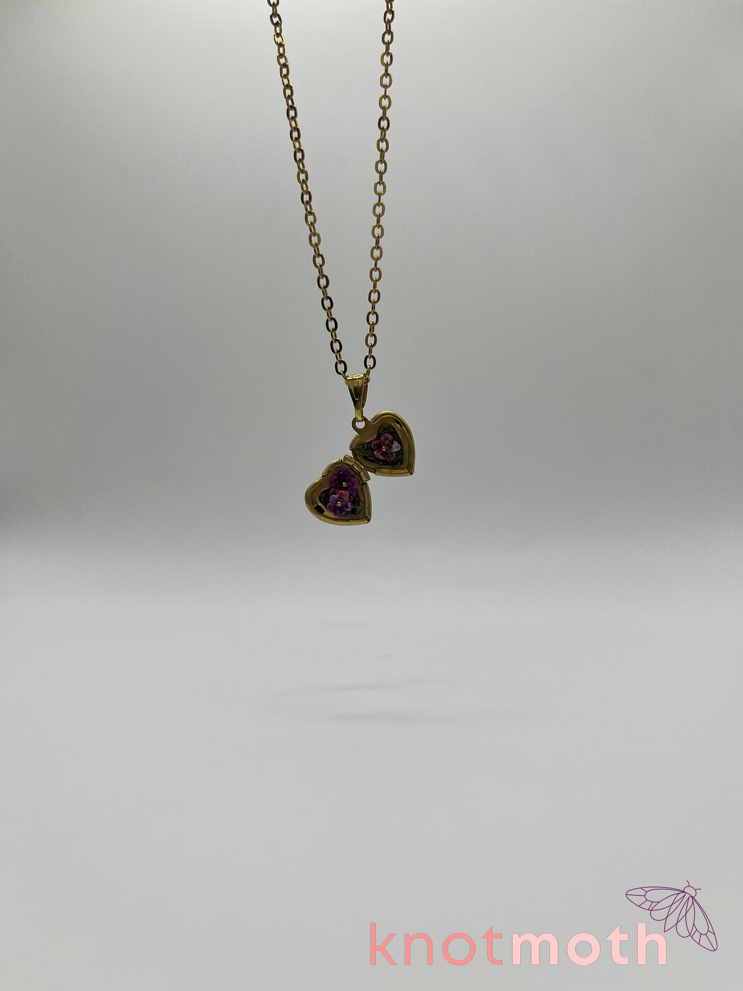 violets floriography micro-crochet heart locket
