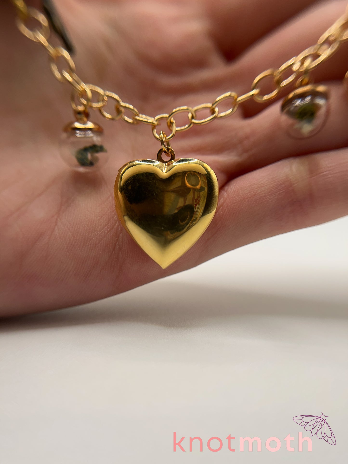 locket & charm necklace with micro crochet details