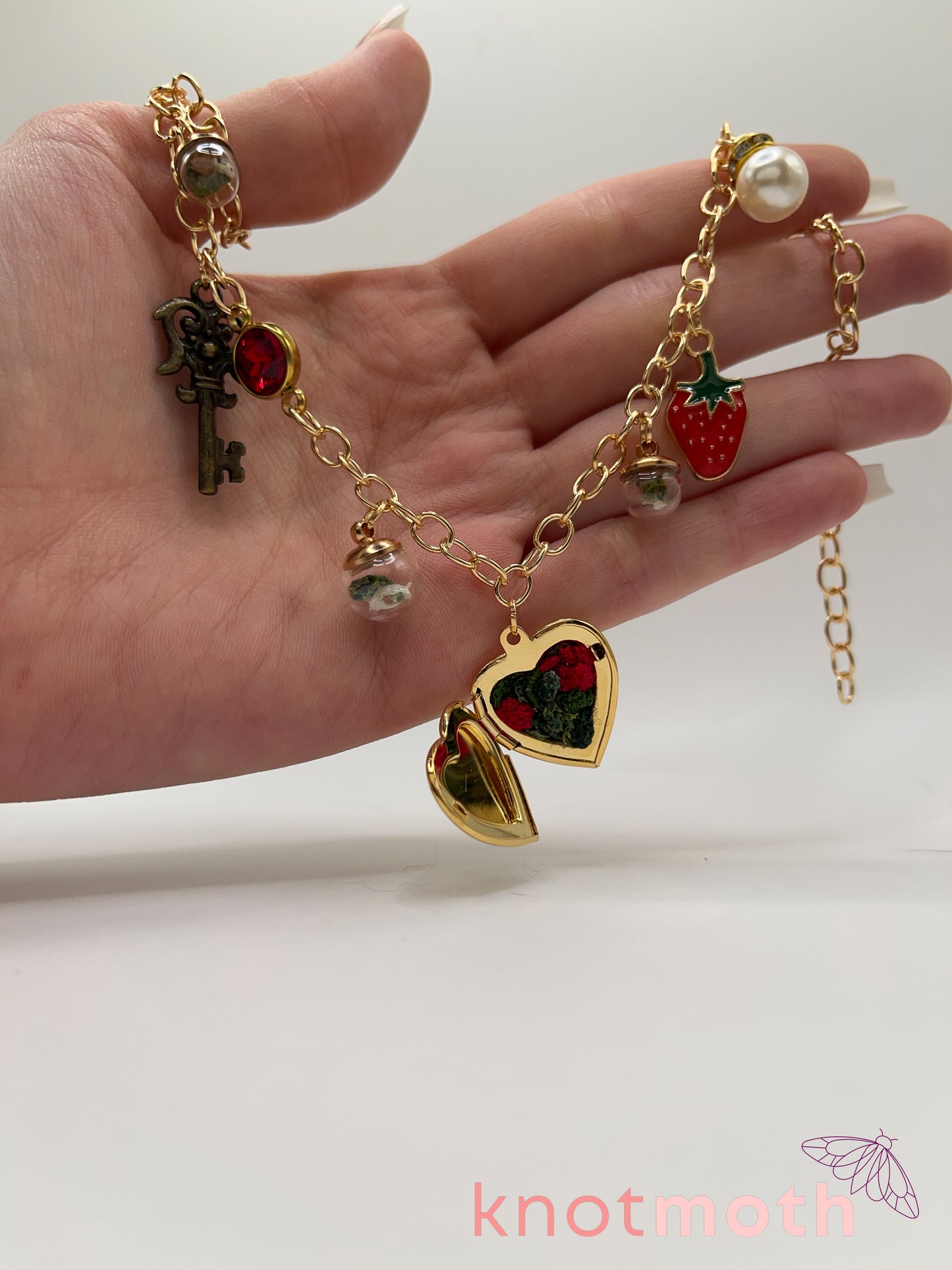 locket & charm necklace with micro crochet details