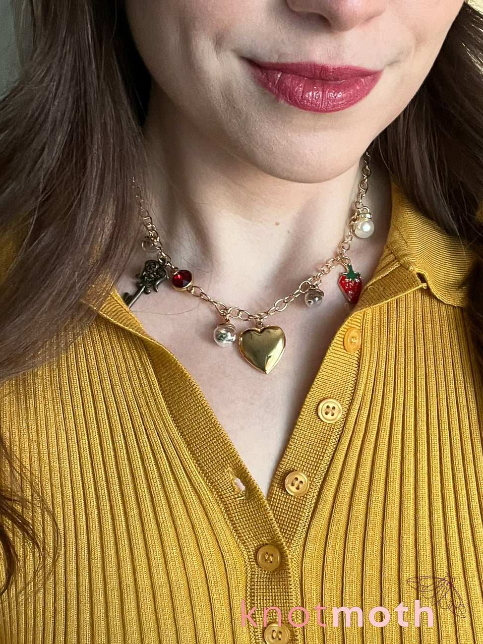 locket & charm necklace with micro crochet details