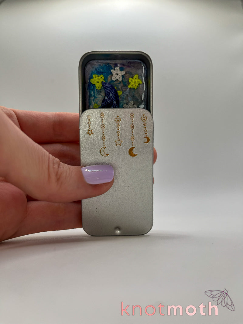 clover cow · moon & flowers nighttime mini tin