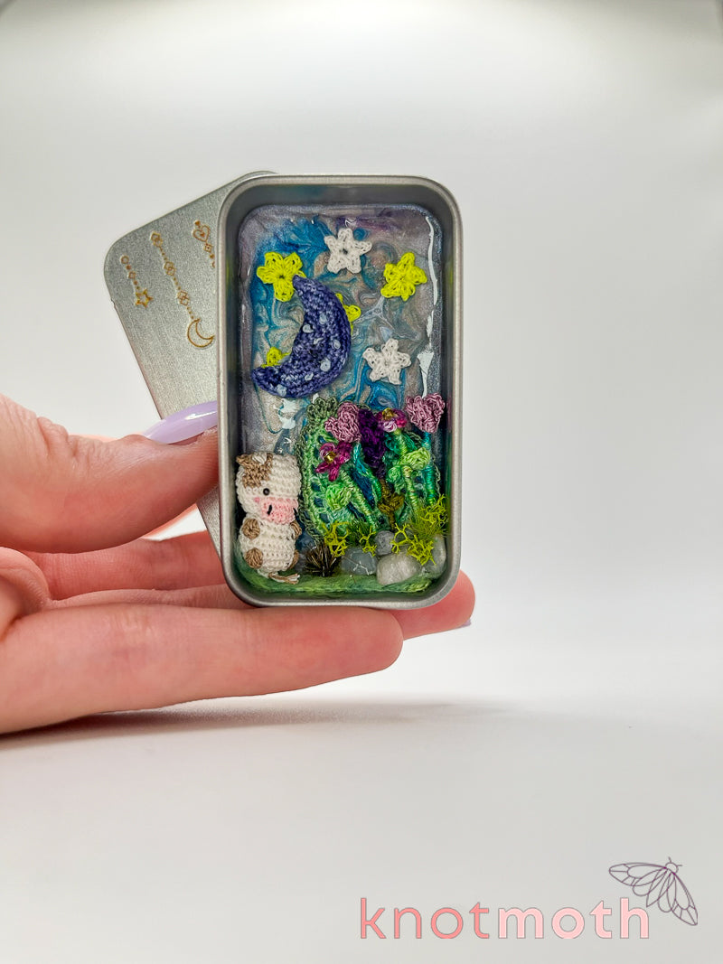 clover cow · moon & flowers nighttime mini tin