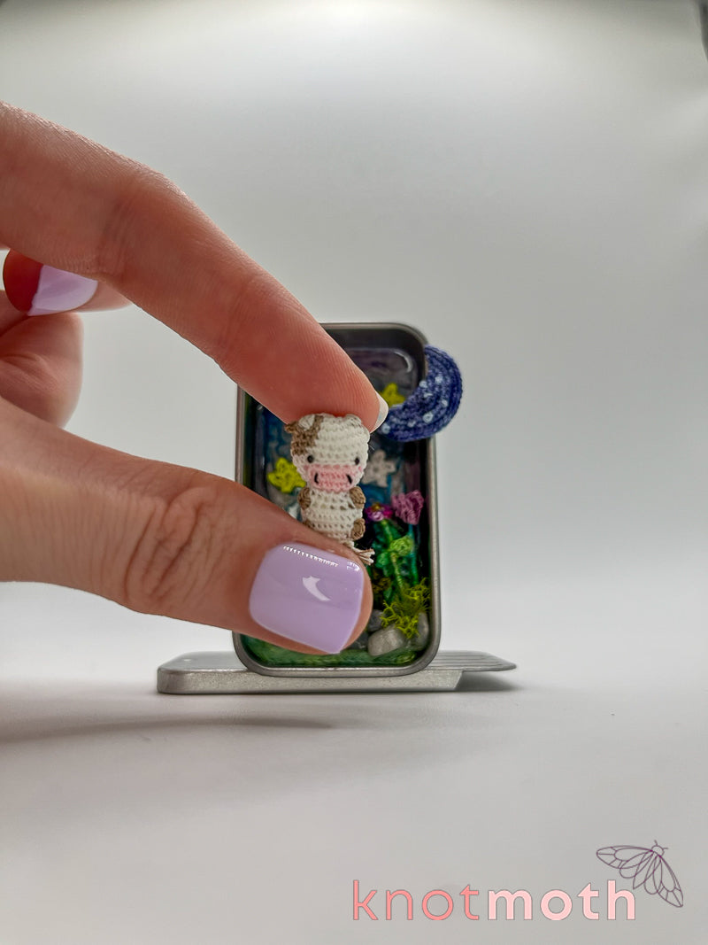 clover cow · moon & flowers nighttime mini tin