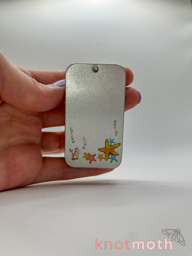 saxon seal · kelp forest mini tin