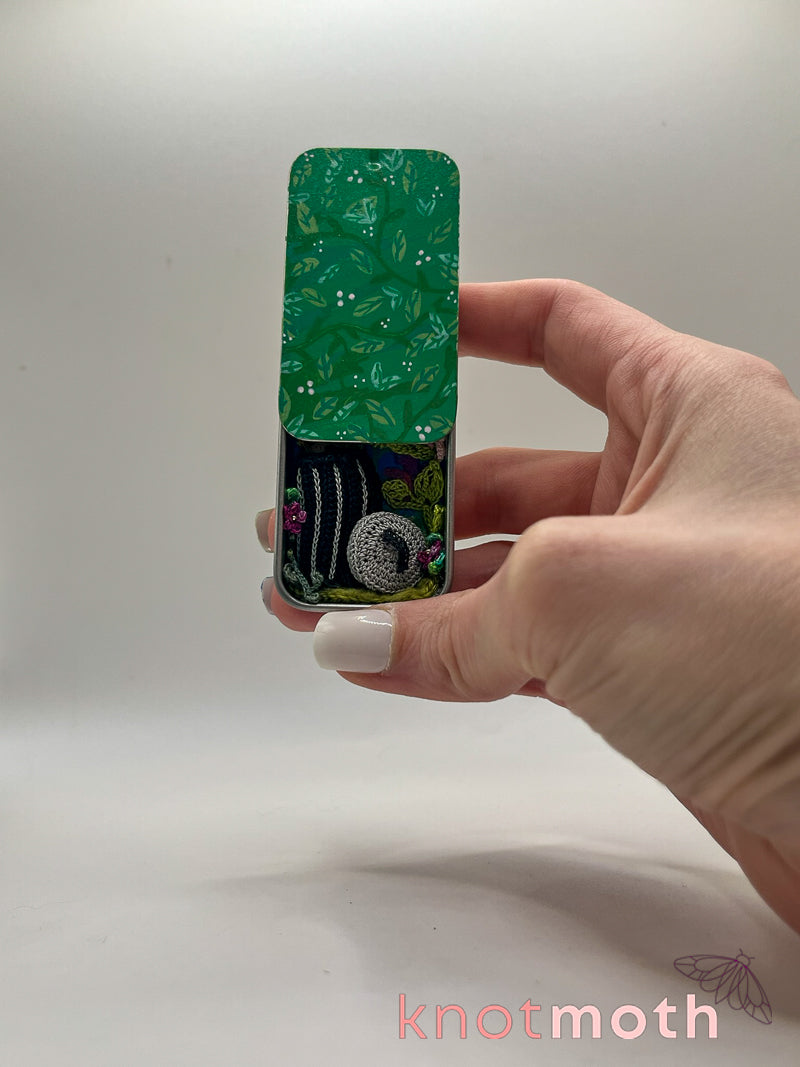 trash possums with pizza mini tin