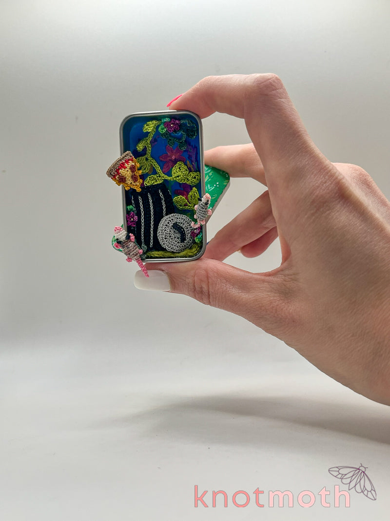 trash possums with pizza mini tin