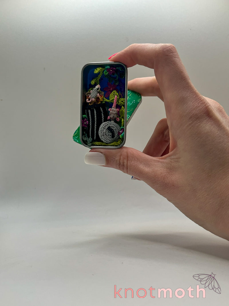 trash possums with pizza mini tin