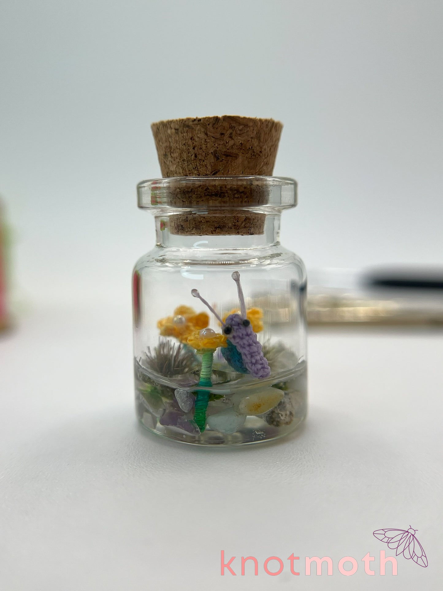 shae snail micro crochet jar with yellow daisies