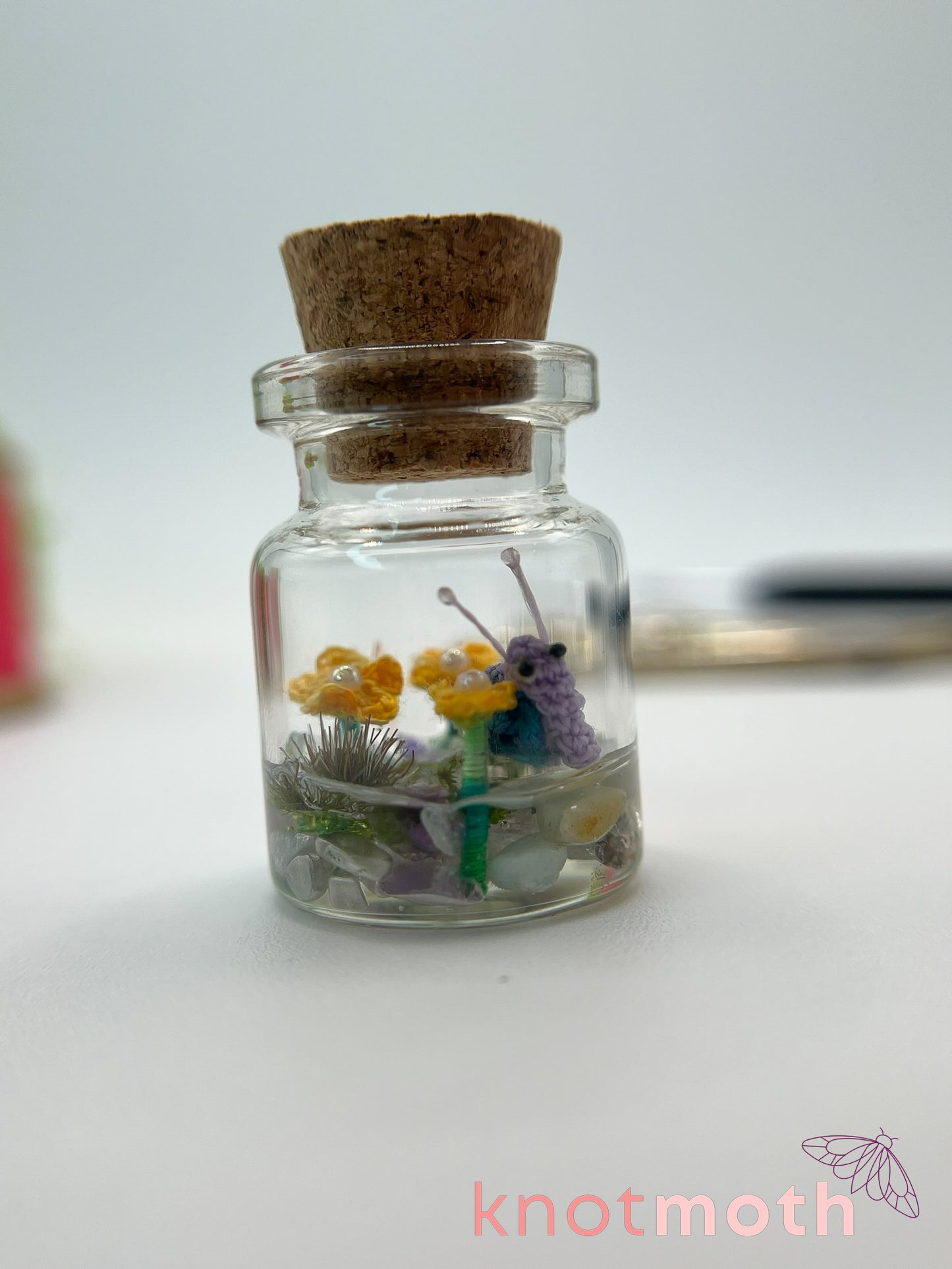 shae snail micro crochet jar with yellow daisies