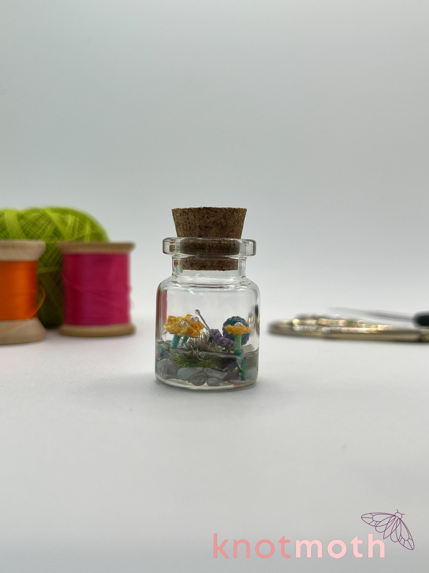 shae snail micro crochet jar with yellow daisies