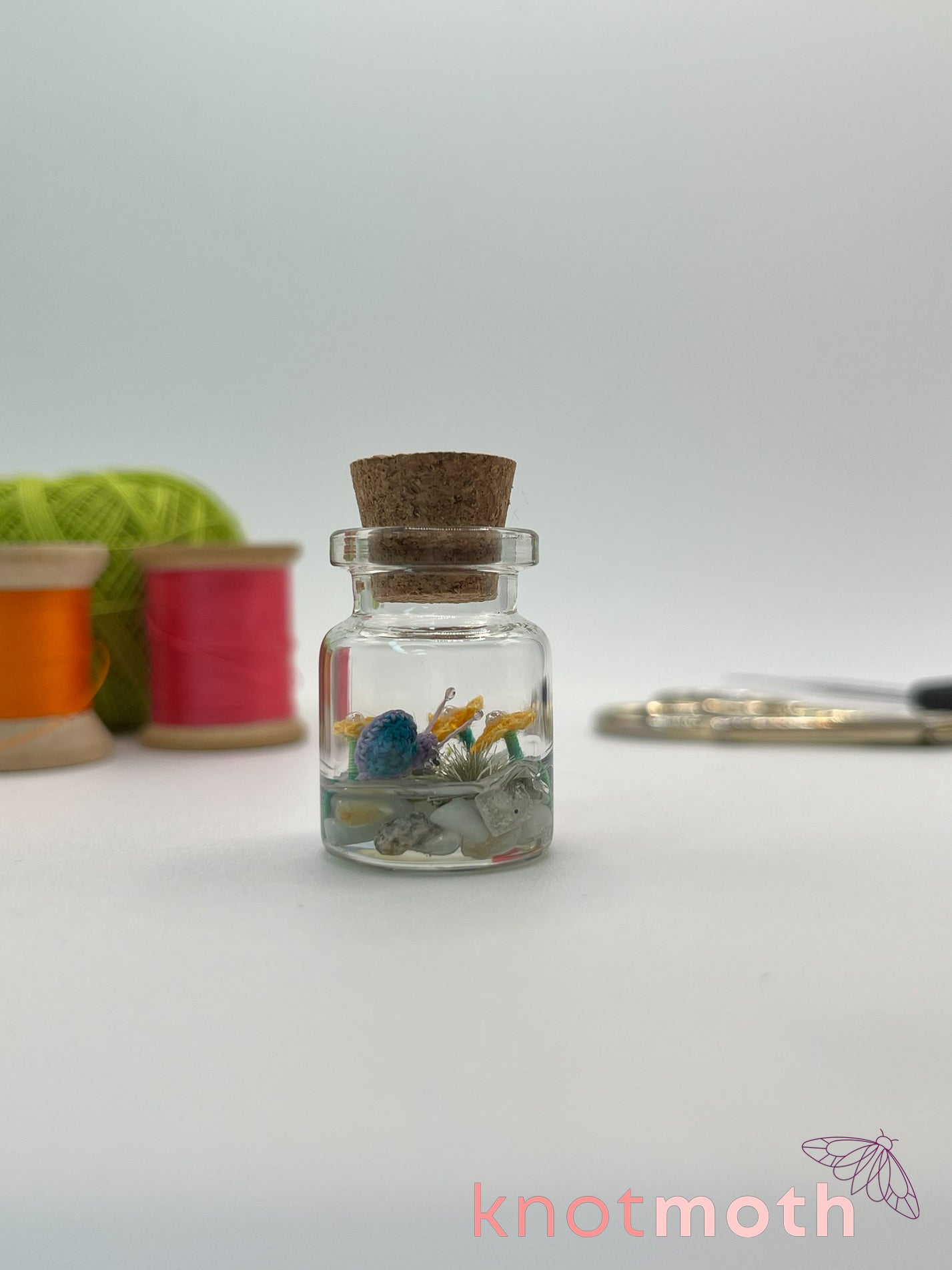 shae snail micro crochet jar with yellow daisies