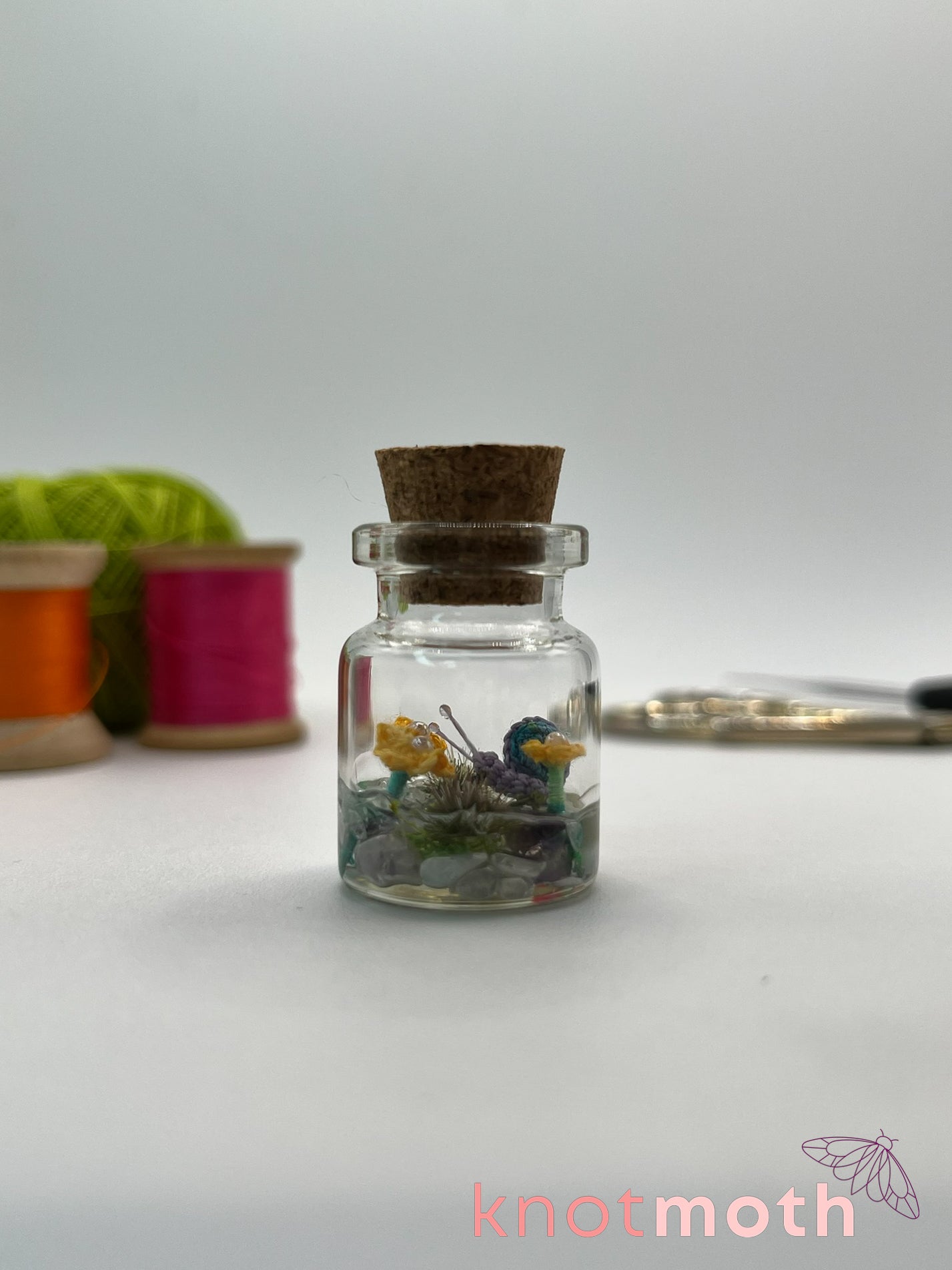 shae snail micro crochet jar with yellow daisies