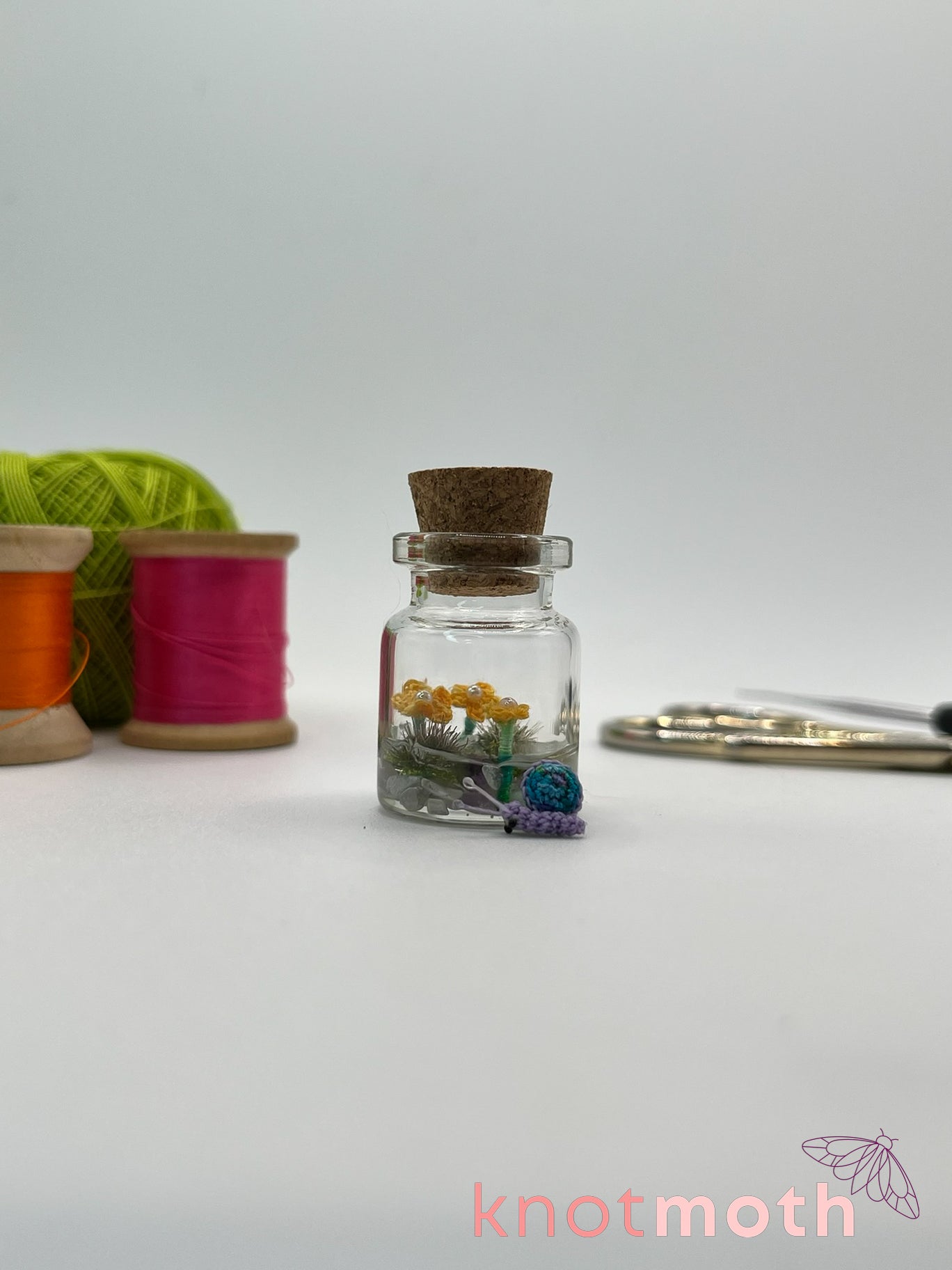 shae snail micro crochet jar with yellow daisies