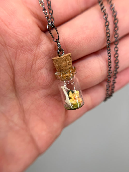 yellow flower & humerus bone pair - bone garden necklace