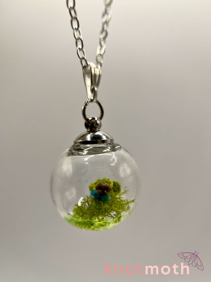 creeping speedwell & femur bone micro crochet mini globe necklace