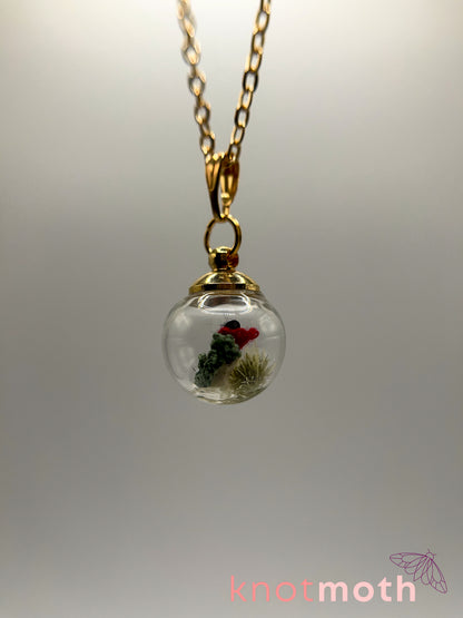 poppy flower & vertebra bone micro crochet mini globe necklace