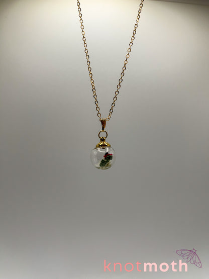 poppy flower & vertebra bone micro crochet mini globe necklace