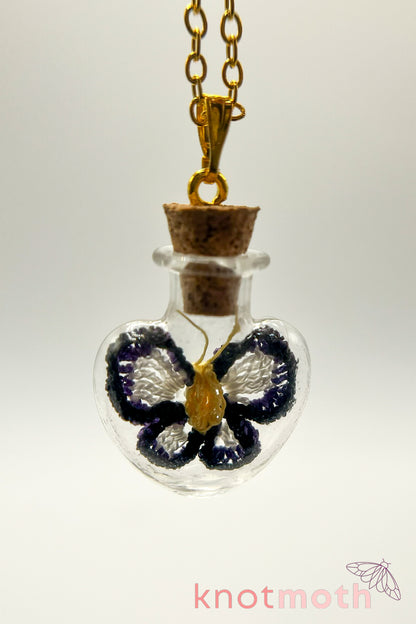 poe butterfly trinket jar necklace