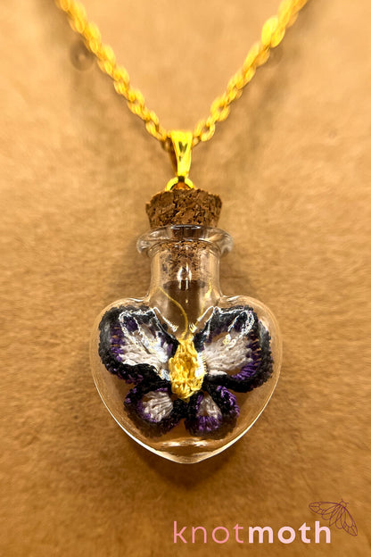 poe butterfly trinket jar necklace