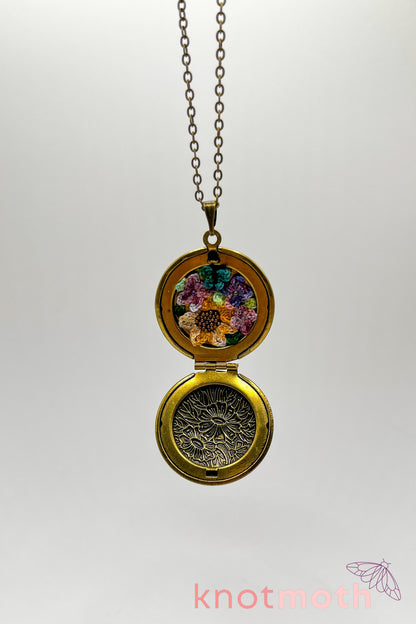 Sunflower, lilacs, and butterfly (joy & love) floriography micro-crochet locket