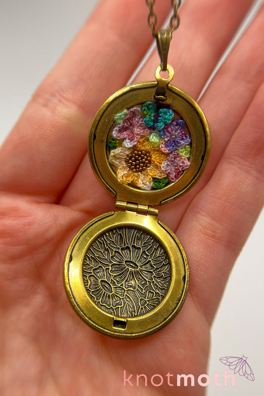 Sunflower, lilacs, and butterfly (joy & love) floriography micro-crochet locket