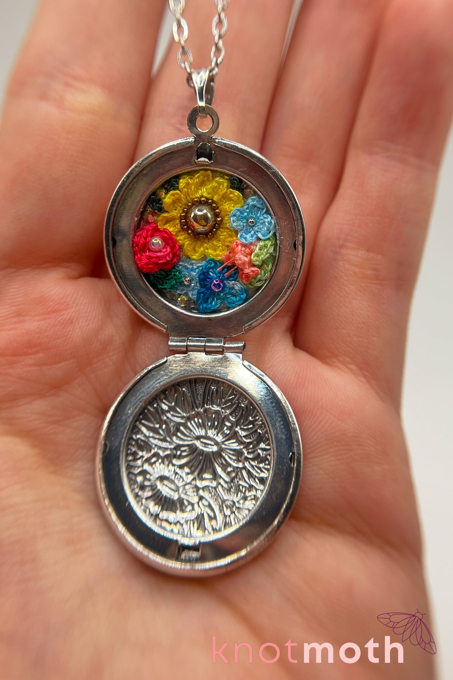 Rose, lily, daisy, and sunflower (love, loyalty, & gratitude) floriography micro-crochet locket